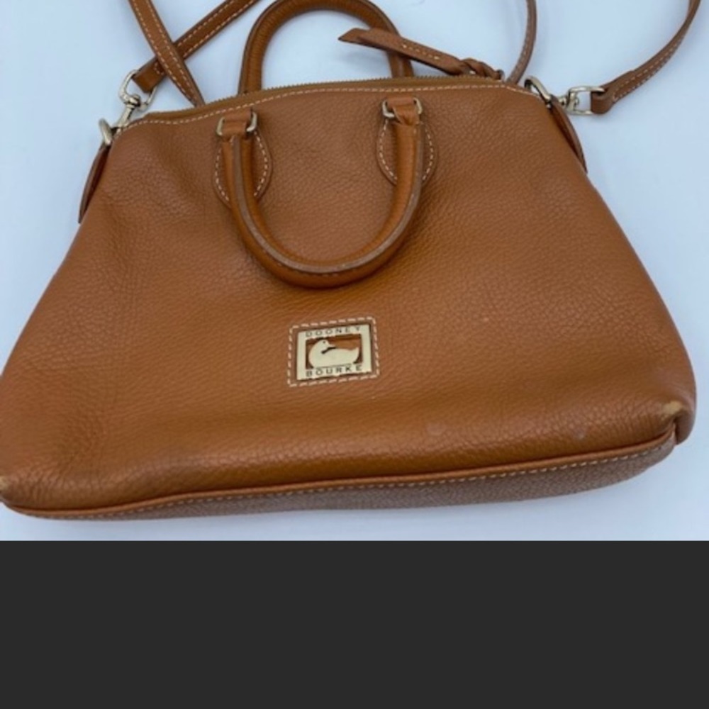 One black and one brown crossbody satchel’s